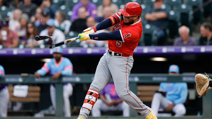 Sep 19, 2025; Denver, Colorado, USA; Los Angeles Angels third baseman Yoan Moncada (5) breaks his bat in the first inning against the Colorado Rockies at Coors Field. Mandatory Credit: Isaiah J. Downing-Imagn Images