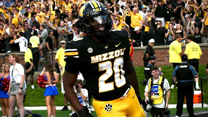 Sep 6, 2025; Columbia, Missouri, USA; Missouri Tigers running back Jamal Roberts (20) celebrates after a touchdown in the second half of the Border War against the Kansas Jayhawks at Faurot Field at Memorial Stadium. Sep 6, 2025; Columbia, Missouri, USA; Missouri Tigers running back Jamal Roberts (20) celebrates after a touchdown in the second half of the Border War against the Kansas Jayhawks at Faurot Field at Memorial Stadium.