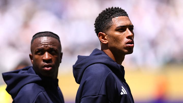[Subscription Customers Only] Jun 18, 2025; Miami Gardens, Florida, USA; Real Madrid CF forward Vinicius Junior (7) and midfielder Jude Bellingham (5) before a group stage match of the 2025 FIFA Club World Cup at Hard Rock Stadium. Mandatory Credit: Hannah Mckay-Reuters via Imagn Images