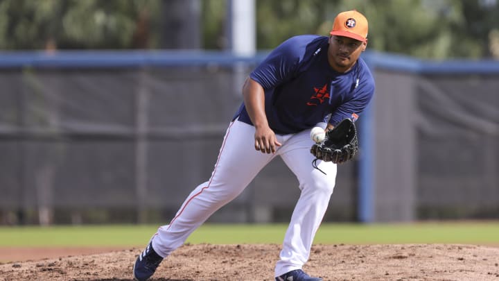 Feb 16, 2024; West Palm Beach, FL, USA; Houston Astros starting pitcher Luis Garcia (77) works out during spring training practice at CACTI Park of the Palm Beaches. Feb 16, 2024; West Palm Beach, FL, USA; Houston Astros starting pitcher Luis Garcia (77) works out during spring training practice at CACTI Park of the Palm Beaches.