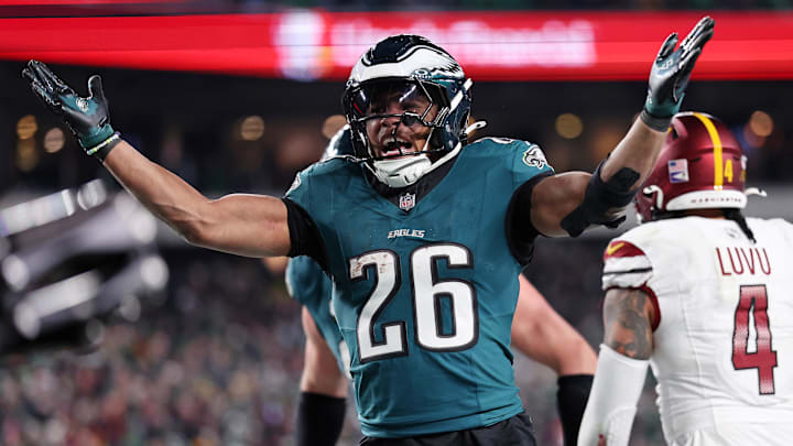 Jan 26, 2025; Philadelphia, PA, USA; Philadelphia Eagles running back Saquon Barkley (26) celebrates after a touchdown against the Washington Commanders during the second half in the NFC Championship game at Lincoln Financial Field. Mandatory Credit: Bill Streicher-Imagn Images