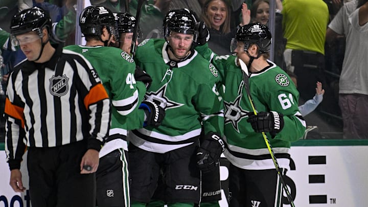 May 11, 2025; Dallas, Texas, USA; Dallas Stars right wing Mikko Rantanen (96) and defenseman Cody Ceci (44) and center Mikael Granlund (64) celebrates a goal during the game between the Dallas Stars and the Winnipeg Jets in game three of the second round of the 2025 Stanley Cup Playoffs at American Airlines Center. Mandatory Credit: Jerome Miron-Imagn Images