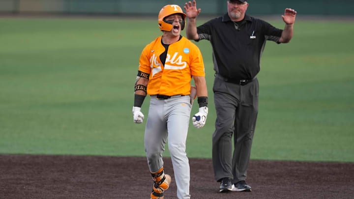 Tennessee infielder Andrew Fischer (11) yells in celebration after hitting a double during a NCAA regional baseball game between the Tennessee Volunteers and Cincinnati Bearcats at Lindsey Nelson Stadium in Knoxville, Tenn., on May 31, 2025.