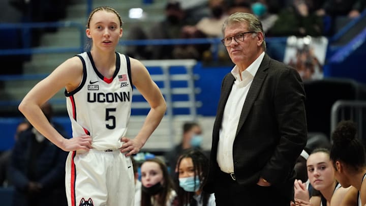 Feb 25, 2022; Hartford, Connecticut, USA; UConn Huskies head coach Geno Auriemma talks with guard Paige Bueckers (5) from the sideline as they take on the St. John's Red Storm in the second half at XL Center. Mandatory Credit: David Butler II-Imagn Images Feb 25, 2022; Hartford, Connecticut, USA; UConn Huskies head coach Geno Auriemma talks with guard Paige Bueckers (5) from the sideline as they take on the St. John's Red Storm in the second half at XL Center. Mandatory Credit: David Butler II-Imagn Images