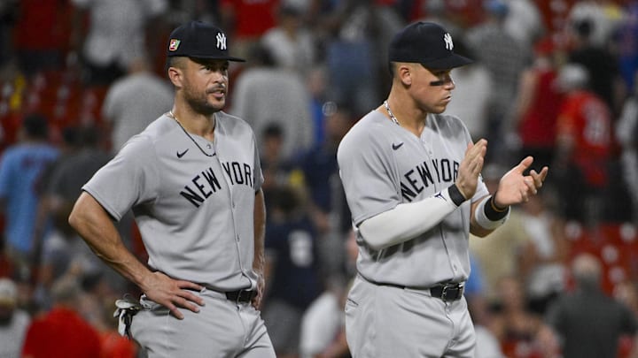 Aug 16, 2025; St. Louis, Missouri, USA;  New York Yankees designated hitter Aaron Judge (99 and Giancarlo Stanton (27) celebrate after the Yankees defeated the St. Louis Cardinals at Busch Stadium. Mandatory Credit: Jeff Curry-Imagn Images