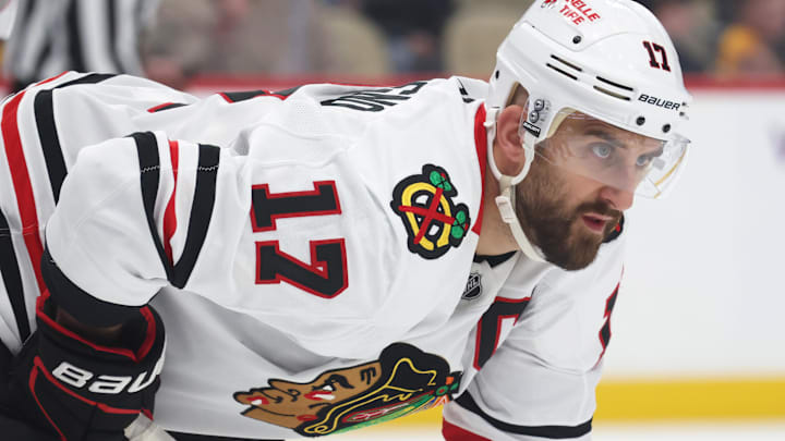Apr 8, 2025; Pittsburgh, Pennsylvania, USA;  Chicago Blackhawks left wing Nick Foligno (17) at the face-off circle against the Pittsburgh Penguins during the third period at PPG Paints Arena. Mandatory Credit: Charles LeClaire-Imagn Images