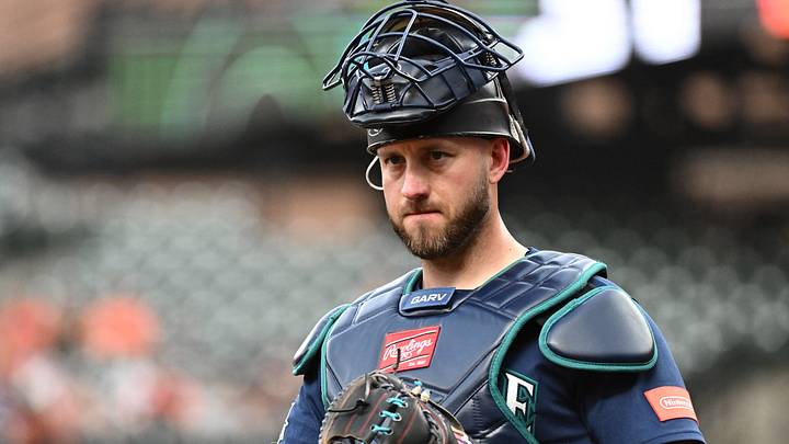 Jun 9, 2026; Baltimore, Maryland, USA; Seattle Mariners catcher Mitch Garver (18) looks toward the dugout during the second inning against the Baltimore Orioles at Oriole Park at Camden Yards. Mandatory Credit: James A. Pittman-Imagn Images Jun 9, 2026; Baltimore, Maryland, USA; Seattle Mariners catcher Mitch Garver (18) looks toward the dugout during the second inning against the Baltimore Orioles at Oriole Park at Camden Yards. Mandatory Credit: James A. Pittman-Imagn Images