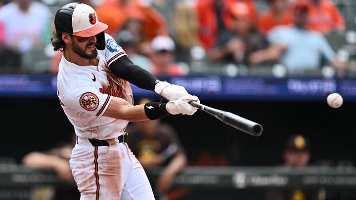 Jun 14, 2026; Baltimore, Maryland, USA;  Baltimore Orioles infielder Blaze Alexander (23) hits a double in the seventh inning against the San Diego Padres at Oriole Park at Camden Yards. Mandatory Credit: Jamie Sabau-Imagn Images