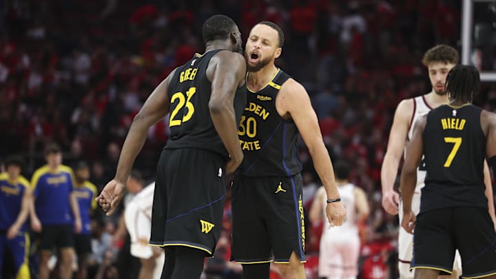 May 4, 2025; Houston, Texas, USA; Golden State Warriors guard Stephen Curry (30) celebrates with forward Draymond Green (23) after a play during game seven of the first round for the 2025 NBA Playoffs against the Houston Rockets at Toyota Center. Mandatory Credit: Troy Taormina-Imagn Images