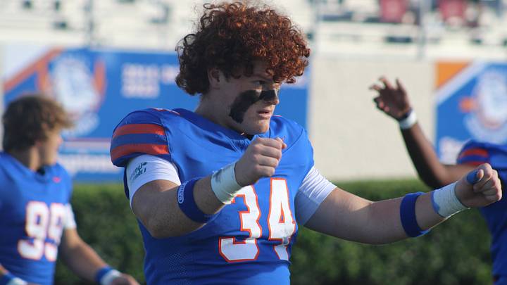 Bolles defensive end Asher Ghioto (34) stretches in warmups before a high school football game against St. Augustine on Sept. 5, 2025. [Clayton Freeman/Florida Times-Union]