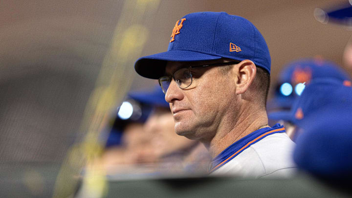 Apr 4, 2026; San Francisco, California, USA; New York Mets manager Carlos Mendoza watches his team take on the San Francisco Giants during the ninth inning at Oracle Park. Mandatory Credit: D. Ross Cameron-Imagn Images