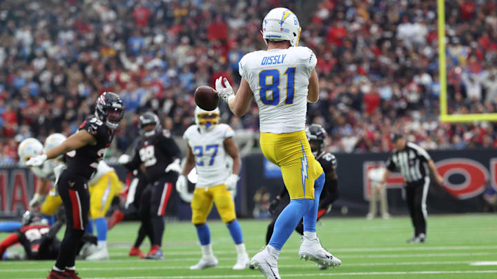 Los Angeles Chargers tight end Will Dissly receives a pass during the first quarter against the Houston Texans in an AFC wild card game at NRG Stadium.