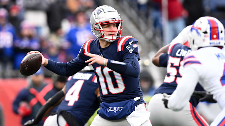 Jan 5, 2025; Foxborough, Massachusetts, USA; New England Patriots quarterback Drake Maye (10) looks to throw against the Buffalo Bills during the first half at Gillette Stadium. Mandatory Credit: Brian Fluharty-Imagn Images