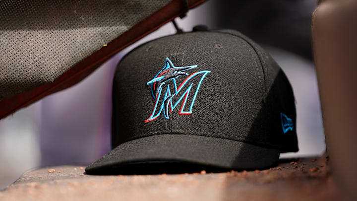 Apr 11, 2019; Cincinnati, OH, USA; A view of a New Era Miami Marlins hat in the dugout during the game against the Cincinnati Reds at Great American Ball Park. Mandatory Credit: Aaron Doster-Imagn Images