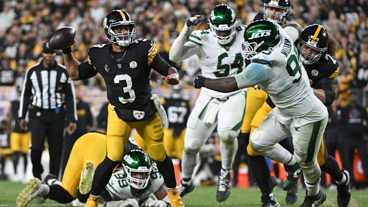 Oct 20, 2024; Pittsburgh, Pennsylvania, USA; Pittsburgh Steelers quarterback Russell Wilson (3) throws pass while being pressured by New York Jets defensive tackle Quinnen Williams (95) during the second quarter at Acrisure Stadium. Mandatory Credit: Barry Reeger-Imagn Images