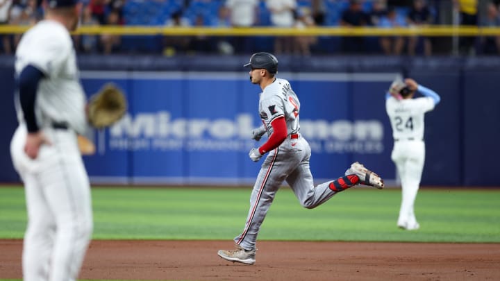 Sep 2, 2024; St. Petersburg, Florida, USA; -Minnesota Twins outfielder Trevor Larnach (9) runs the bases after hitting a three-run home run against the Tampa Bay Rays in the second inning at Tropicana Field. Mandatory Credit: Nathan Ray Seebeck-USA TODAY Sports Sep 2, 2024; St. Petersburg, Florida, USA; -Minnesota Twins outfielder Trevor Larnach (9) runs the bases after hitting a three-run home run against the Tampa Bay Rays in the second inning at Tropicana Field. Mandatory Credit: Nathan Ray Seebeck-USA TODAY Sports