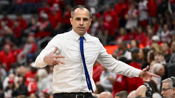 Mar 9, 2025; St. Louis, Missouri, USA; Drake Bulldogs head coach Ben McCollum reacts after his team made a three point shot against the Bradley Braves during the first half of the Missouri Valley Conference Tournament Championship at Enterprise Center. Mandatory Credit: Jeff Curry-Imagn Images Mar 9, 2025; St. Louis, Missouri, USA; Drake Bulldogs head coach Ben McCollum reacts after his team made a three point shot against the Bradley Braves during the first half of the Missouri Valley Conference Tournament Championship at Enterprise Center. Mandatory Credit: Jeff Curry-Imagn Images