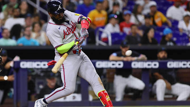 Apr 12, 2024; Miami, Florida, USA; Atlanta Braves designated hitter Marcell Ozuna (20) hits a