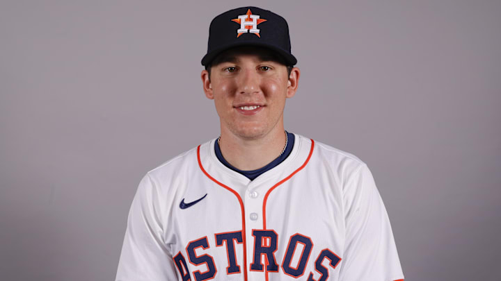 Feb 20, 2025; West Palm Beach, FL, USA;  Houston Astros right hand pitcher AJ Blubaugh poses for a photo at the Houston Astros media day