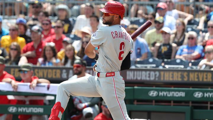 Philadelphia Phillies center fielder Justin Crawford (2) drives in a run on a fields choice ground out.