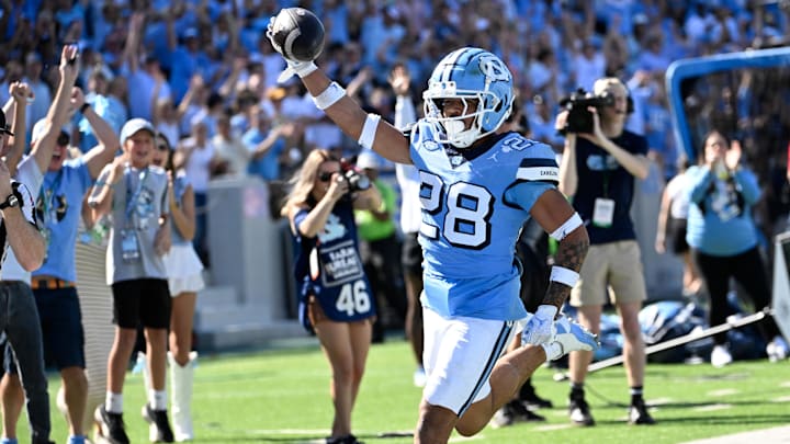 North Carolina Tar Heels RB Omarion Hampton runs for a touchdown in the third quarter at Kenan Memorial Stadium.