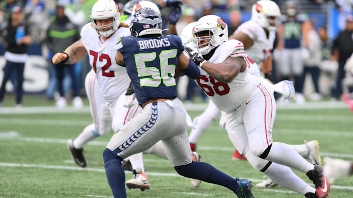 Arizona Cardinals offensive tackle Kelvin Beachum (68) blocks Seattle Seahawks linebacker Jordyn Brooks (56).