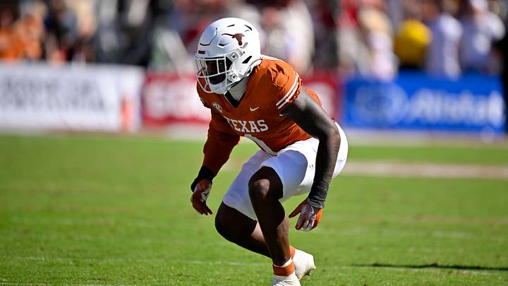 Texas Longhorns defensive end Colin Simmons during the game between the Longhorns and the Oklahoma Sooners at the Cotton Bowl. Texas Longhorns defensive end Colin Simmons during the game between the Longhorns and the Oklahoma Sooners at the Cotton Bowl.