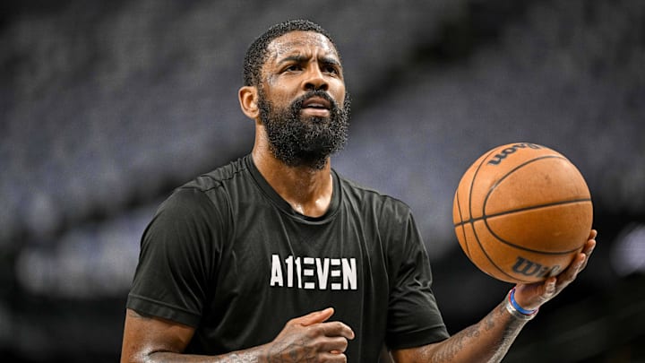 Dallas Mavericks guard Kyrie Irving (11) warms up before the game between the Dallas Mavericks and the Oklahoma City Thunder in game four of the second round for the 2024 NBA playoffs at American Airlines Center. Mandatory Credit: Jerome Miron-Imagn Images