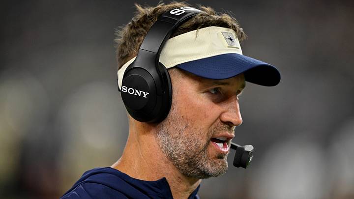Dallas Cowboys head coach Brian Schottenheimer looks on during the game between the Cowboys and the Saints at AT&T Stadium. Dallas Cowboys head coach Brian Schottenheimer looks on during the game between the Cowboys and the Saints at AT&T Stadium.