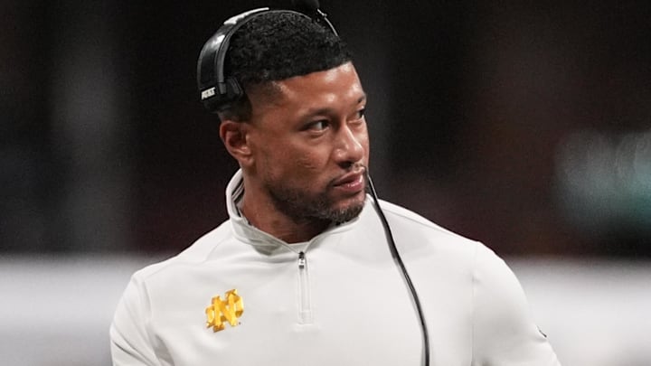 Jan 20, 2025; Atlanta, GA, USA; Notre Dame Fighting Irish head coach Marcus Freeman reacts against the Ohio State Buckeyes in the second half in the CFP National Championship college football game at Mercedes-Benz Stadium.