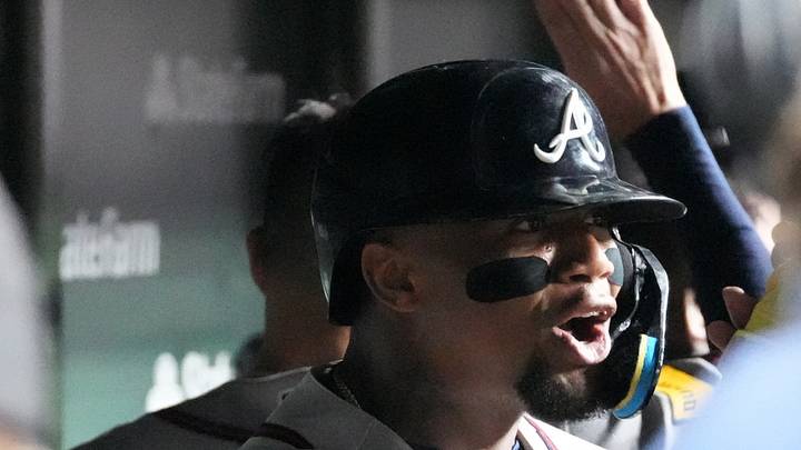 Sep 15, 2026; Chicago, Illinois, USA;  Atlanta Braves designated hitter Ronald Acuna Jr. (13) celebrates in the dugout after hitting a two-run home run against the Chicago Cubs during the sixth inning at Wrigley Field.  Mandatory Credit: David Banks-Imagn Images