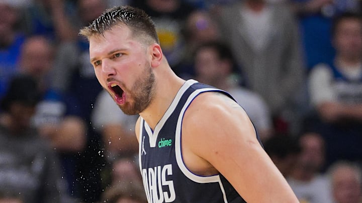 Oct 29, 2024; Minneapolis, Minnesota, USA; Dallas Mavericks guard Luka Doncic (77) talks to fans against the Minnesota Timberwolves in the fourth quarter at Target Center. Mandatory Credit: Brad Rempel-Imagn Images