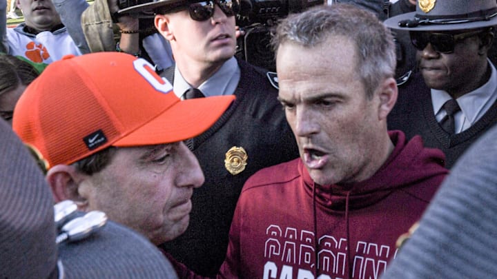 Nov 30, 2024; Clemson, South Carolina, USA; Clemson head coach Dabo Swinney and South Carolina Head Coach Shane Beamer talk after the game at Memorial Stadium. Nov 30, 2024; Clemson, South Carolina, USA; Clemson head coach Dabo Swinney and South Carolina Head Coach Shane Beamer talk after the game at Memorial Stadium.