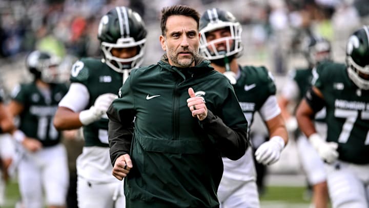 Michigan State's defensive coordinator Joe Rossi runs to the locker room before the game against Penn State on Saturday, Nov. 15, 2025, at Spartan Stadium in East Lansing.