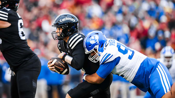 BYU DT Anisi Purcell gets a sack against Iowa State BYU DT Anisi Purcell gets a sack against Iowa State
