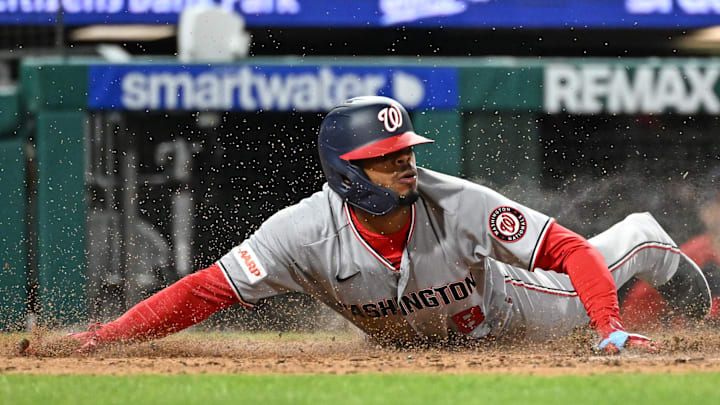 Mar 30, 2026: Washington Nationals third baseman José Tena (8) slides safely into home against the Philadelphia Phillies during the sixth inning at Citizens Bank Park. Mar 30, 2026: Washington Nationals third baseman José Tena (8) slides safely into home against the Philadelphia Phillies during the sixth inning at Citizens Bank Park.