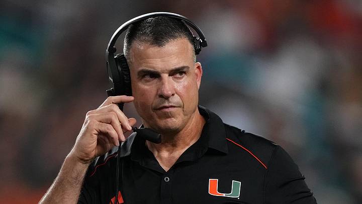 Oct 7, 2023; Miami Gardens, Florida, USA; Miami Hurricanes head coach Mario Cristobal walks on the field in the second half against the Georgia Tech Yellow Jackets at Hard Rock Stadium. Mandatory Credit: Jasen Vinlove-Imagn Images Oct 7, 2023; Miami Gardens, Florida, USA; Miami Hurricanes head coach Mario Cristobal walks on the field in the second half against the Georgia Tech Yellow Jackets at Hard Rock Stadium. Mandatory Credit: Jasen Vinlove-Imagn Images