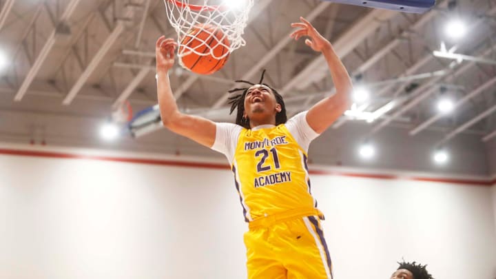 Montverde   s Kayden Allen (21) dunks the ball on a fast break against Whitehaven during a basketball game in the Winter Classic at the McDonald Insurance Arena on Friday, Feb. 09, 2024 in Bartlett, Tenn.