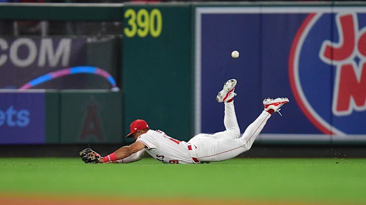 May 6, 2025; Anaheim, California, USA; Los Angeles Angels center fielder Kyren Paris (19) misses the double of Toronto Blue Jays second baseman Andres Gimenez (0) during the fifth inning at Angel Stadium. Mandatory Credit: Gary A. Vasquez-Imagn Images