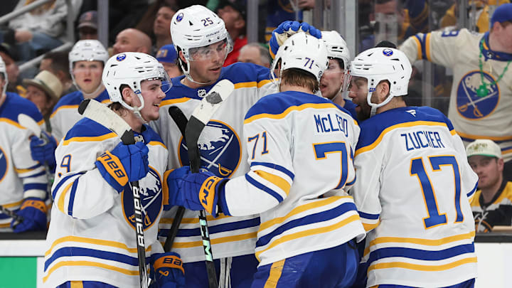 A group of Buffalo Sabres players including Ryan McLeod and Jason Zucker