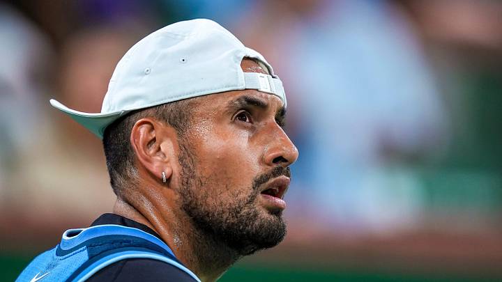 Nick Kyrgios looks up at the video boards before a point Nick Kyrgios looks up at the video boards before a point