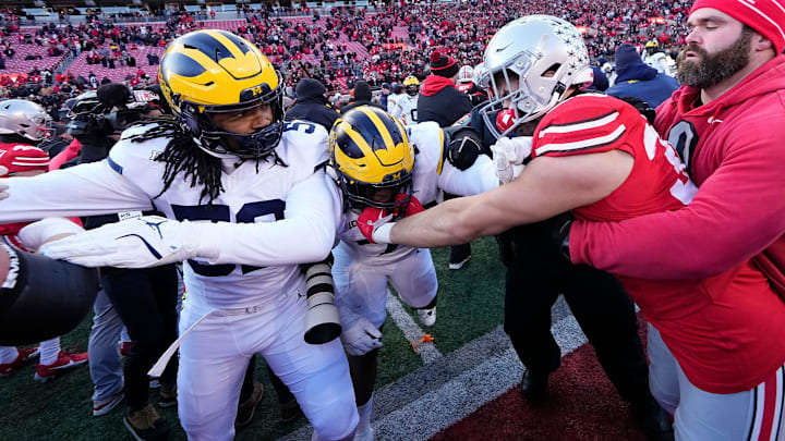 Michigan Wolverines and Ohio State Buckeyes fight following the NCAA football game at Ohio Stadium in Columbus on Saturday, Nov. 30, 2024. Michigan won 13-10.