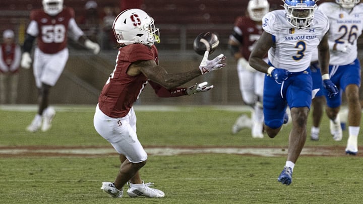 Sep 27, 2025; Stanford, California, USA;  Stanford Cardinal wide receiver Caden High (0) catches the football during the fourth quarter against the San Jose State Spartans at Stanford Stadium. Mandatory Credit: Stan Szeto-Imagn Images
