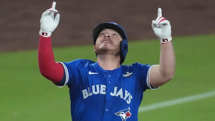 Toronto Blue Jays catcher Alejandro Kirk (30) celebrates after hitting a three-run home run.