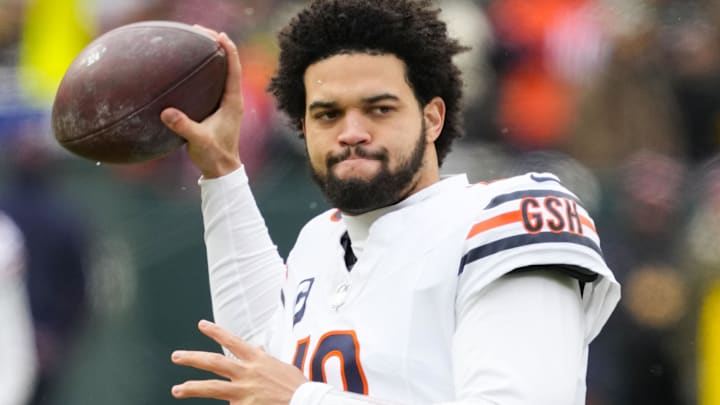 Jan 5, 2025; Green Bay, Wisconsin, USA;  Chicago Bears quarterback Caleb Williams (18) during warmups prior to the game against the Green Bay Packers at Lambeau Field. Mandatory Credit: Jeff Hanisch-Imagn Images