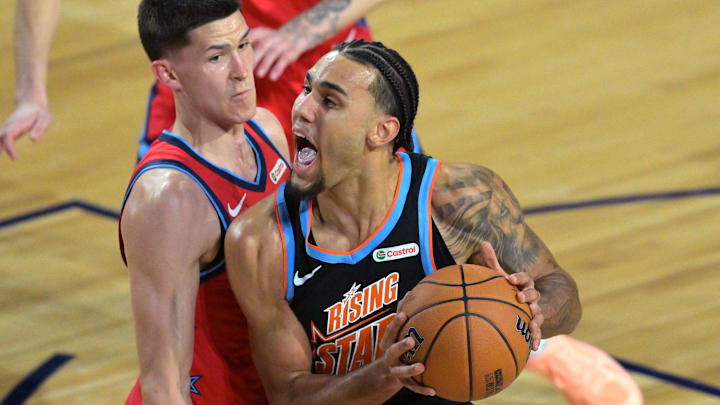 Feb 13, 2026; Inglewood, California, USA; Team T-Mac guard Jaylon Tyson (20) of the Cleveland Cavaliers controls the ball against Team Vince guard Egor Demin (8) of the Brooklyn Nets during an NBA All Star Rising Stars game at Intuit Dome. Mandatory Credit: Jayne Kamin-Oncea-Imagn Images