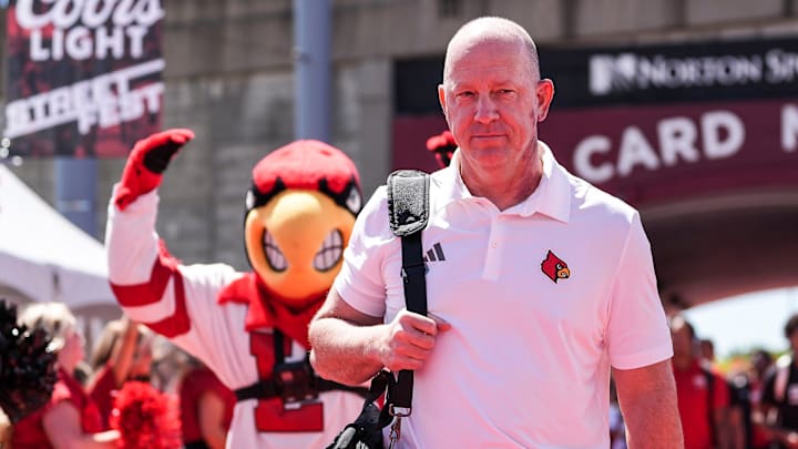 Louisville head football coach Jeff Brohm leads the team on the Card March before the game against EKU at the Cardinals' season opener Saturday, August 30, 2025 at L&N Federal Credit Union Stadium in Louisville, Kentucky. Louisville head football coach Jeff Brohm leads the team on the Card March before the game against EKU at the Cardinals' season opener Saturday, August 30, 2025 at L&N Federal Credit Union Stadium in Louisville, Kentucky.
