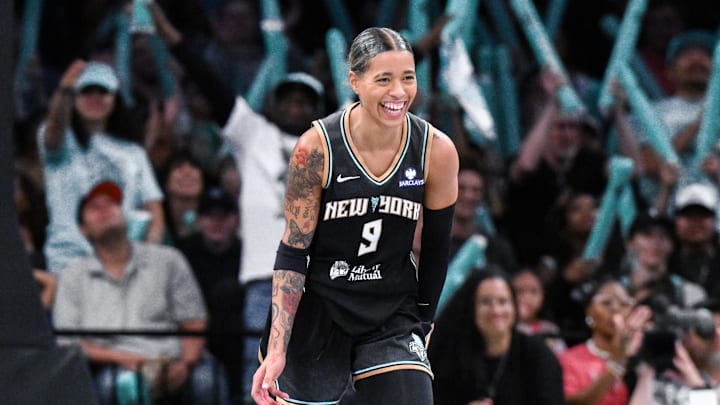 Jun 1, 2025; Brooklyn, New York, USA; New York Liberty guard Natasha Cloud (9) reacts during the second half against the Connecticut Sun at Barclays Center. Mandatory Credit: John Jones-Imagn Images