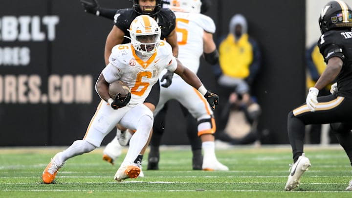 Nov 30, 2024; Nashville, Tennessee, USA;  Tennessee Volunteers running back Dylan Sampson (6) runs the ball against the Vanderbilt Commodores during the second half at FirstBank Stadium. Mandatory Credit: Steve Roberts-Imagn Images