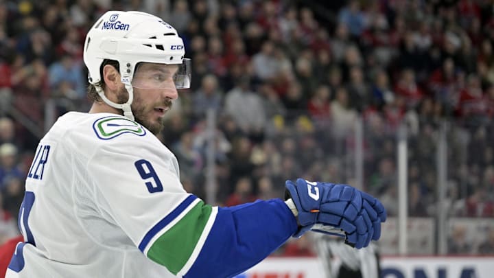Jan 6, 2025; Montreal, Quebec, CAN; Vancouver Canucks forward J.T. Miller (9) prepares for a face off against the Montreal Canadiens during the second period at the Bell Centre. Mandatory Credit: Eric Bolte-Imagn Images